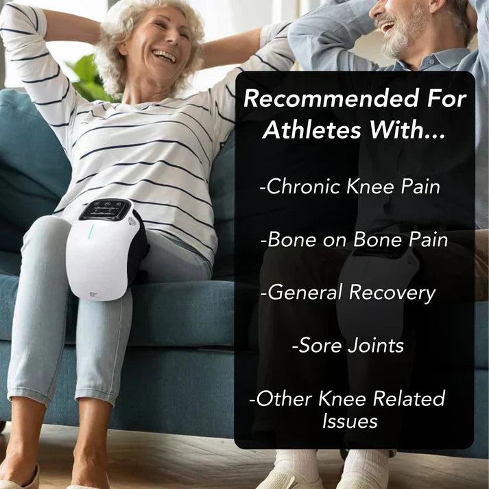 User wearing red light knee massager while relaxing for at-home muscle and joint comfort